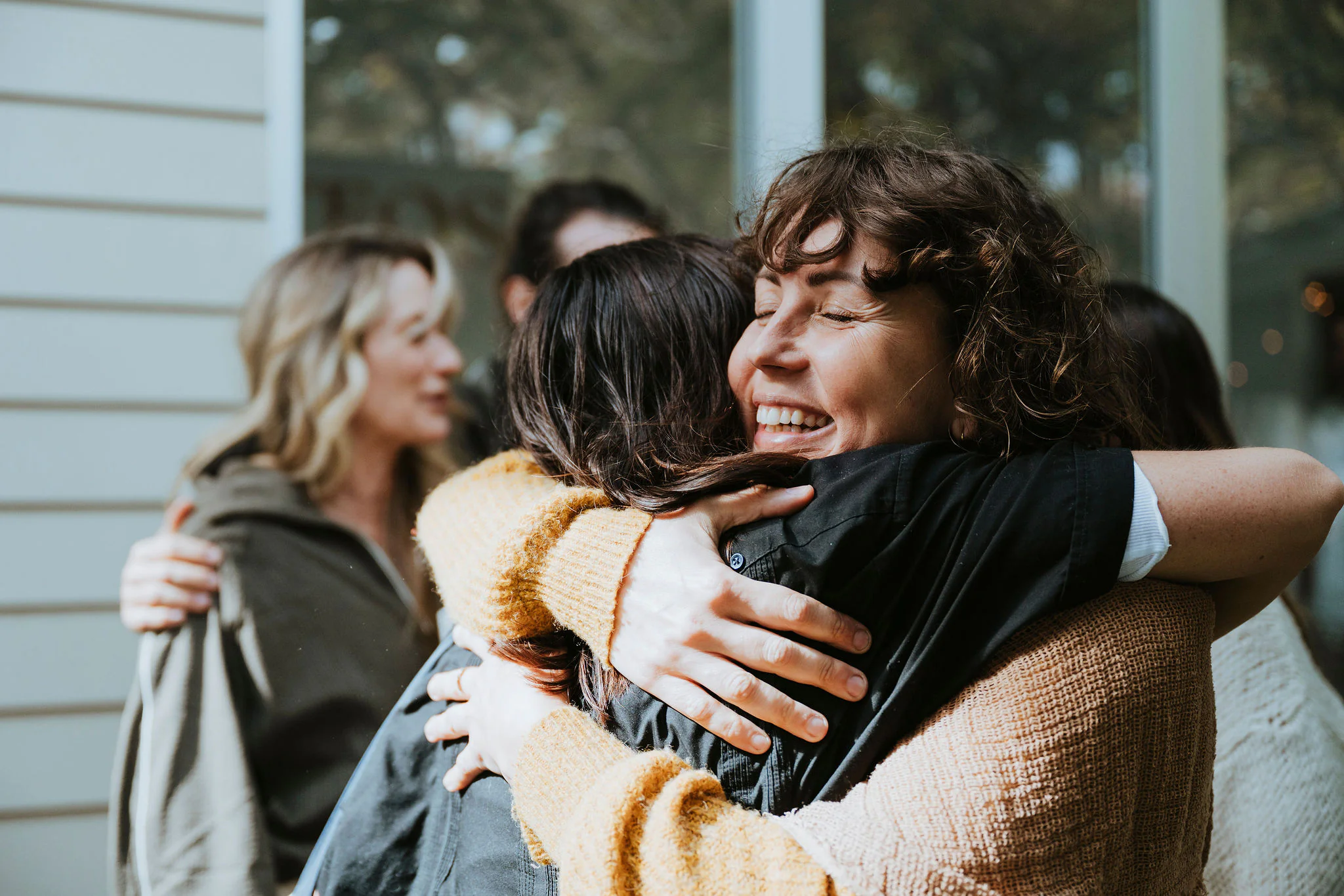 The Zenko community in a group hug