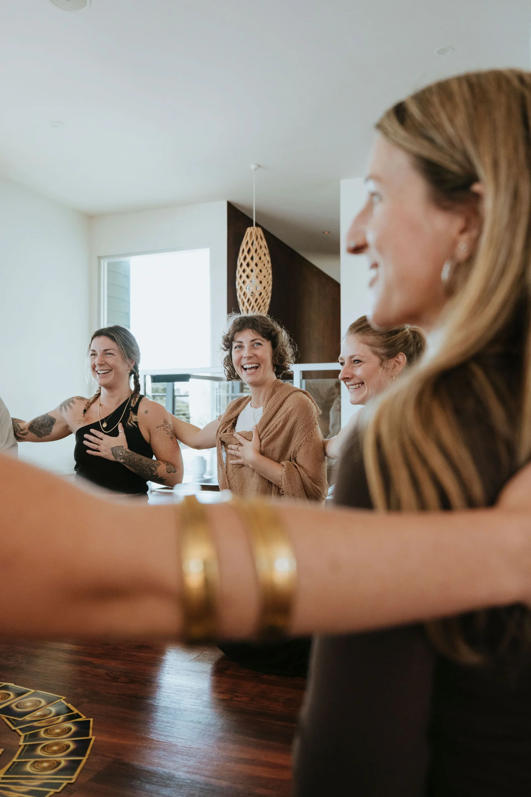 Women laughing together in a circle
